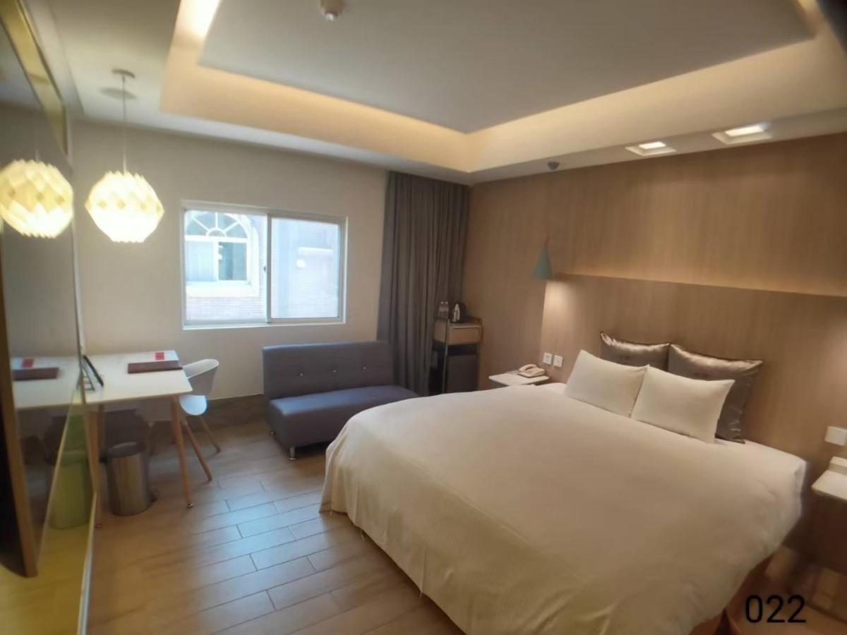 Wunsin Motel Лонгтан Экстерьер фото